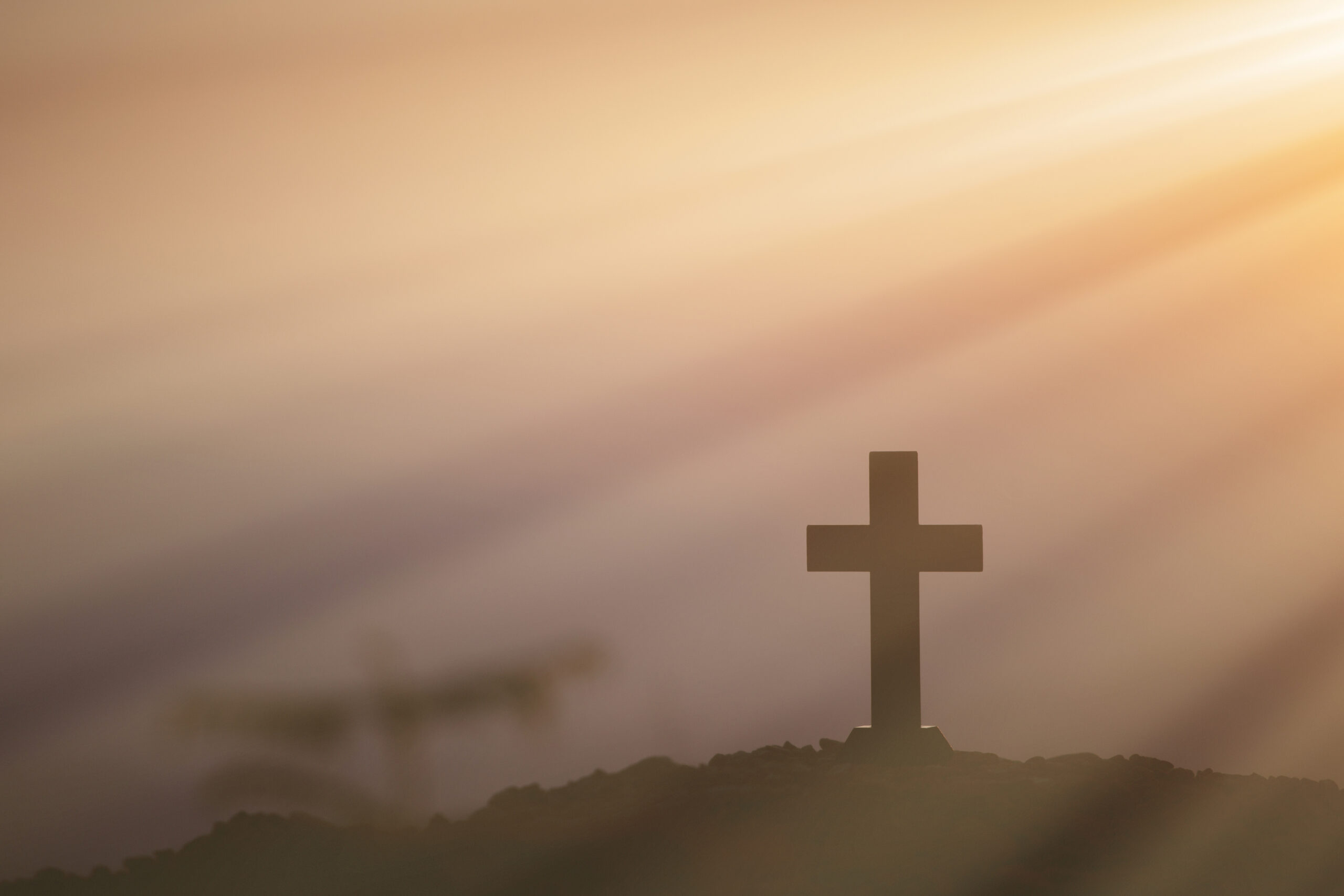Resurrection concept:Crucifixion Of Jesus Christ Cross At Sunset
